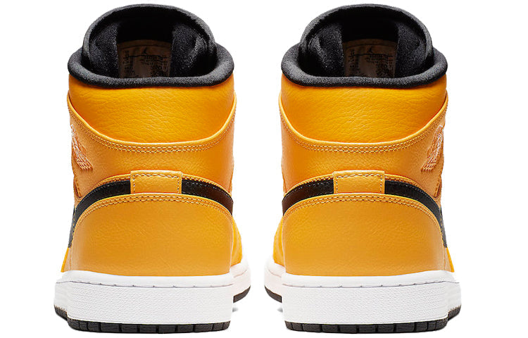 Air Jordan 1 Mid University Gold 554724-700